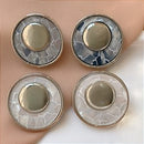 BRINCO CÍRCULO DUPLO MADREPÉROLA DOURADO BIJU